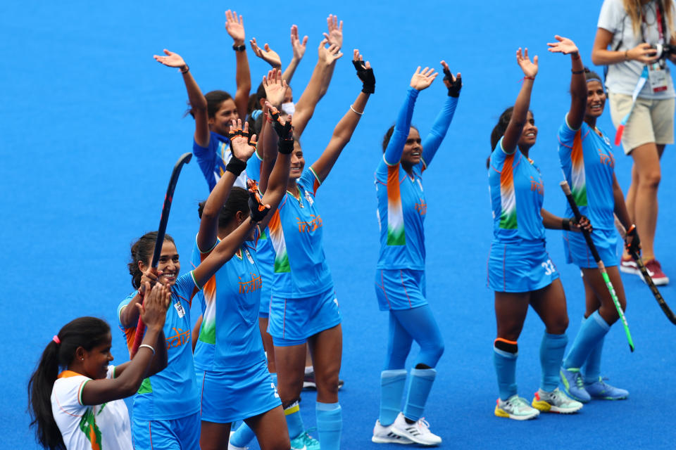 Tokyo 2020 Olympics - Hockey - Women - Quarterfinal - Australia v India - Oi Hockey Stadium, Tokyo, Japan - August 2, 2021. Players of India wave to their supporters in the stands after winning their match. REUTERS/Bernadett Szabo