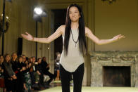 Designer Vera Wang acknowledges audience applause after her collection was modeled during Fashion Week in New York, Tuesday, Feb. 11, 2020. (AP Photo/Richard Drew)