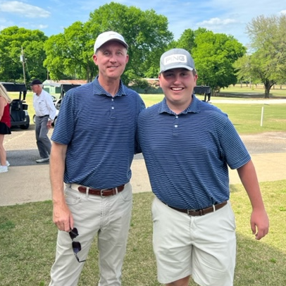 Tuscaloosa Academy golf coach Scott Taylor poses with TA golfer Jack Smith after Smith made a hole-in-one on No. 12 in competition at Selma Country Club on Thursday, April 21, 2022. Tuscaloosa Academy photo