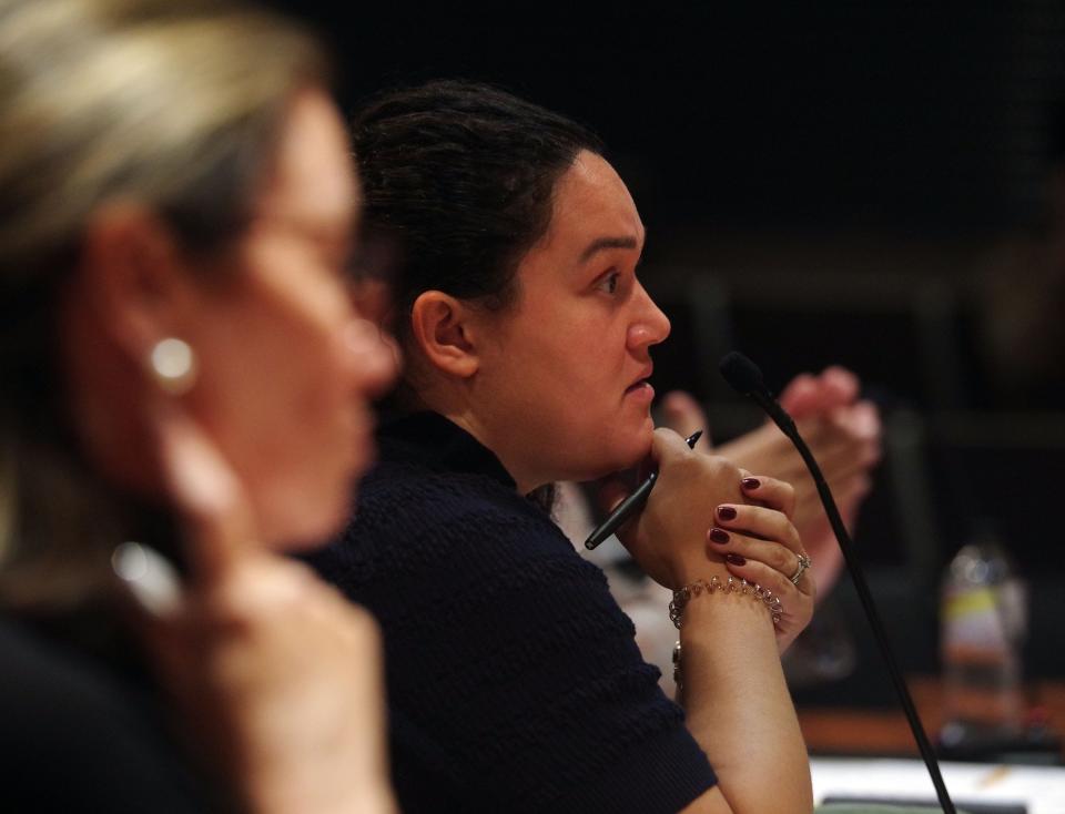 Brockton School Committee Ward 2 member Cynthia Rivas Mendes, right, answers a question put forth by Mayor Robert Sullivan, the chair of the school committee, on Thursday, Sept. 14, 2023. On the left is school committee Vice Chair Kathleen Ehlers.