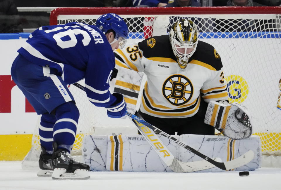 Boston Bruins' goaltender Linus Ullmark (35) stops Toronto Maple Leafs' Mitchell Marner (16) during the third period of an NHL hockey game, Wednesday, Feb.1, 2023 in Toronto. (Frank Gunn/The Canadian Press via AP)