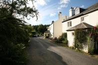 <p>Tucked away in a hamlet, this well-liked <a href="https://www.countryliving.com/uk/travel-ideas/staycation-uk/g38629195/pubs-with-rooms/" rel="nofollow noopener" target="_blank" data-ylk="slk:pub with rooms;elm:context_link;itc:0;sec:content-canvas" class="link ">pub with rooms</a> is the ideal base for exploring the vast wilderness of Dartmoor, where ponies and sheep crop the grasses, and some 129 tors, strange granite outcrops, beg to be climbed. Step out of the door, and within 25 minutes you can be standing on Haytor, enjoying panoramic views as far as the sea. </p><p>The 18-mile Templer Way, a disused granite tramway, leads all the way to Teignmouth. Staff can advise on the best forays for you, including a spring bluebell walk. Bedrooms are cosy and old-fashioned. Two are dog friendly. There is traditional pub grub at lunchtime and more sophisticated cooking at night.</p><p><a class="link " href="https://www.booking.com/hotel/gb/the-rock-inn.en-gb.html?aid=2070935&label=hotels-for-walkers" rel="nofollow noopener" target="_blank" data-ylk="slk:CHECK AVAILABILITY;elm:context_link;itc:0;sec:content-canvas">CHECK AVAILABILITY</a></p>