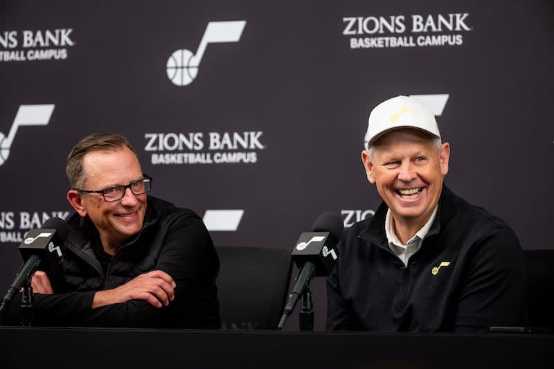 Utah Jazz general manager Justin Zanik and Utah Jazz CEO Danny Ainge talk to journalists during an end-of-season press conference.