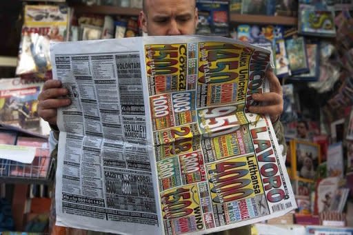 A man looks for jobs in Naples. Europe is set for a rebound to growth the latest forecasts show, but unemployment will keep on rising, a conundrum that highlights the difficult economic reforms that still need to be made