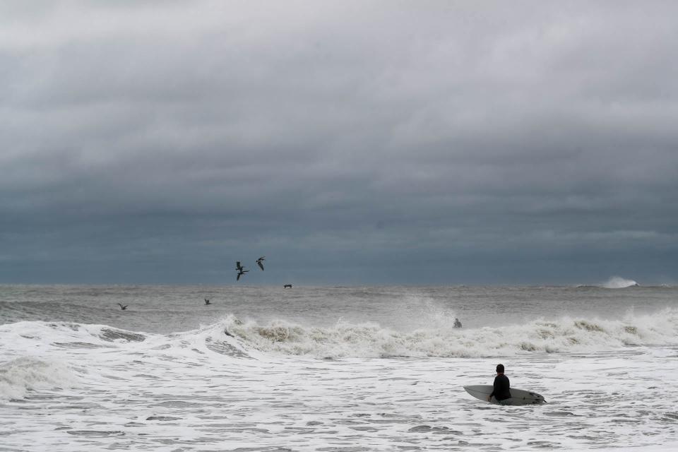 Dark clouds and waves on Tybee Island as Hurricane Ian moves along the Georgia coast on September 30, 2022.