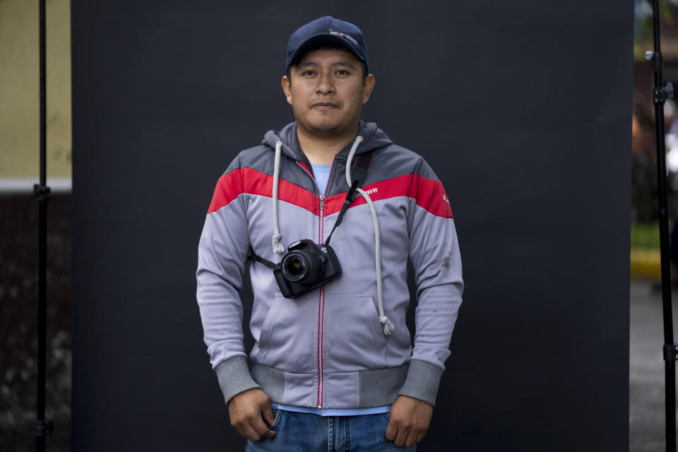 Herbert Gudiel Pemech Estrada poses for portraits in Chimaltenango, Guatemala, Tuesday, June 20, 2023. With only a few days before voters go the polls on June 25, the 30-year-old photographer was leaning toward casting a null vote, essentially a protest vote, because he thinks the government party is somehow manipulating the parties in this election and that real change will be unattainable through any of them. (AP Photo/Moises Castillo)