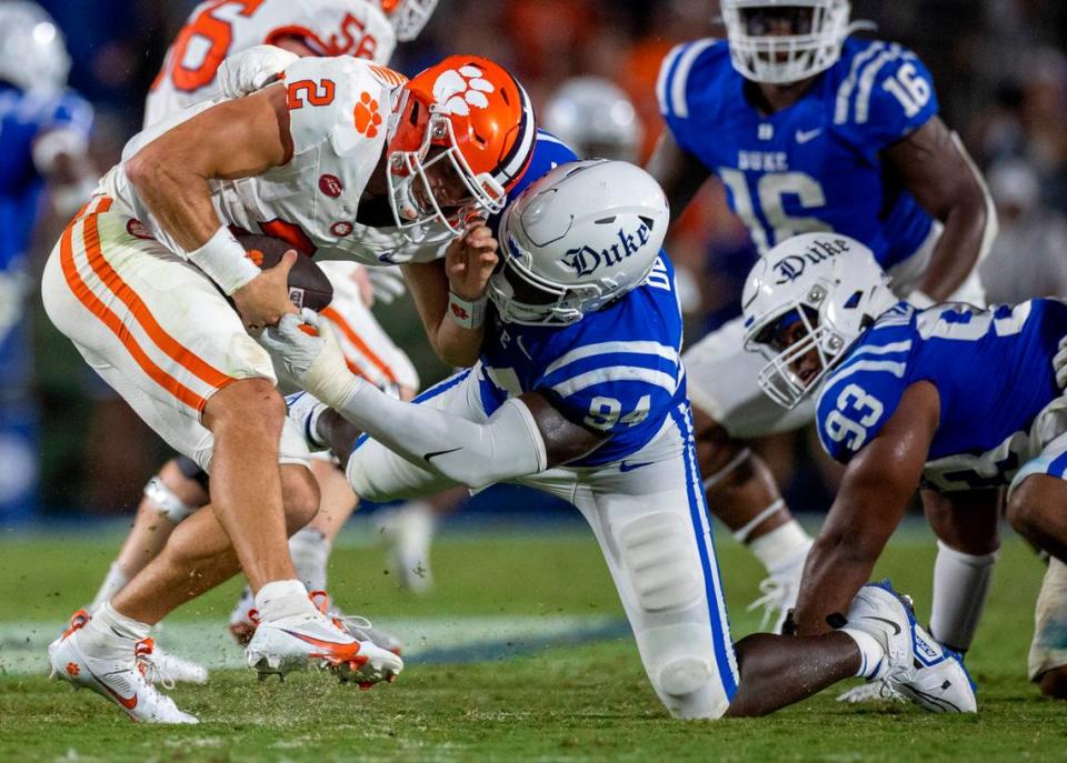 Duke’s R.J. Oben (94) sacks Clemson quarterback Cade Klubnik (2) for a nine yard loss in the second quarter on Monday, September 4, 2023 at Wallace Wade Stadium Stadium in Durham, N.C.