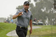 Richard Bland, of England, acknowledges the gallery after making his birdie putt on the second green during the second round of the U.S. Open Golf Championship, Friday, June 18, 2021, at Torrey Pines Golf Course in San Diego. (AP Photo/Marcio Jose Sanchez)