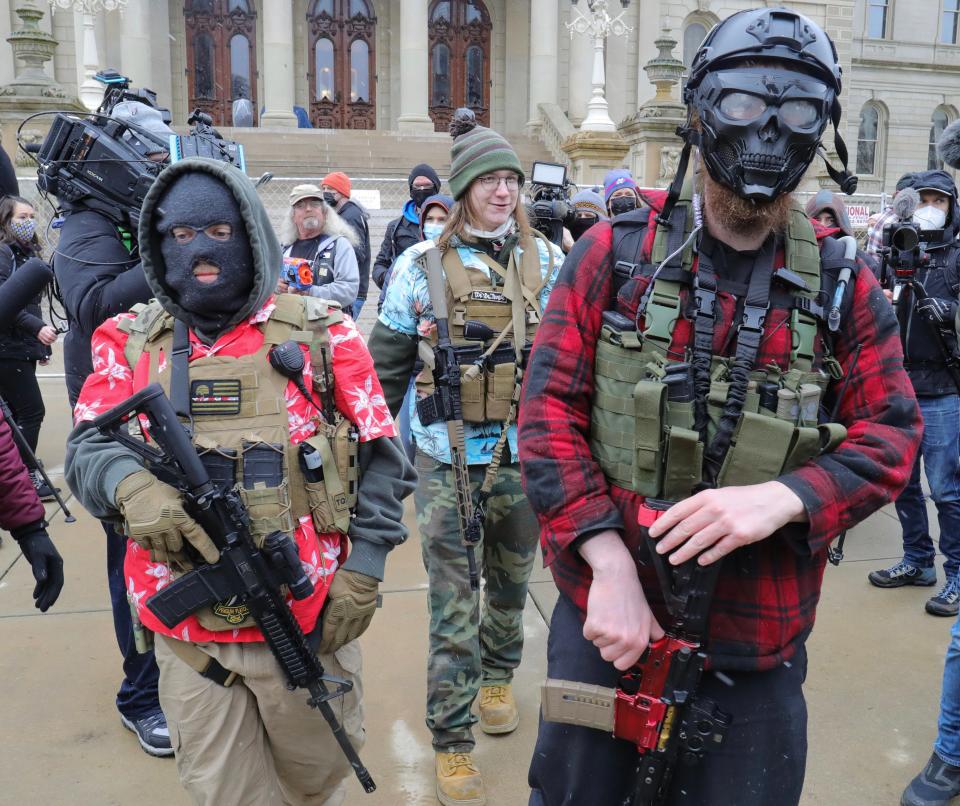 Armed members of the Boogaloo Bois are seen outside of the Capitol building in Lansing on Sunday, Jan. 17, 2021.
(Photo: Kirthmon F. Dozier, Detroit Free Press)