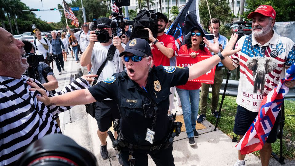 Supporters of former President Donald Trump clash with protestors outside his Trump National Doral resort on June 12, 2023, in Doral, Florida. - Jabin Botsford/The Washington Post/Getty Images