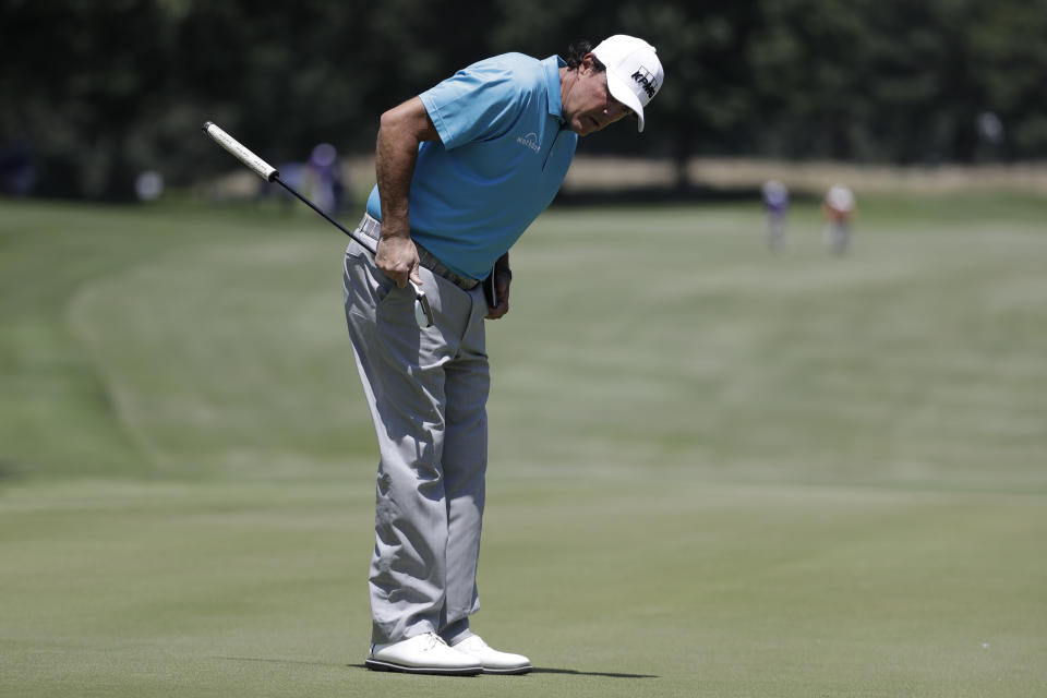 Phil Mickelson reacts to his putt on the fifth green during the first round of the World Golf Championships-FedEx St. Jude Invitational Thursday, July 25, 2019, in Memphis, Tenn. (AP Photo/Mark Humphrey)