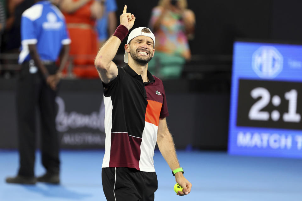 Grigor Dimitrov of Bulgaria reacts after he won his final match against Holger Rune of Denmark 6-3, 7-5, during the Brisbane International tennis tournament in Brisbane, Australia, Sunday, Jan. 7, 2024. (AP Photo/Tertius Pickard)