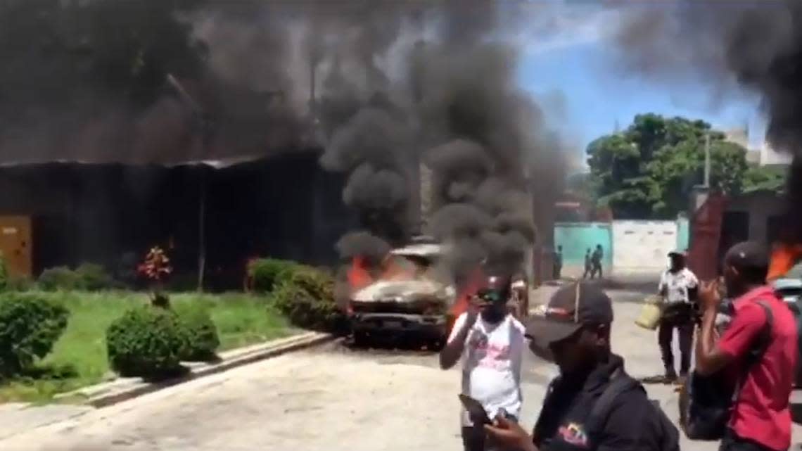 Protesters attacked the parking lot of the government-owned National Television of Haiti on Thursday, Sept. 15, 2022, and set a car on fire.