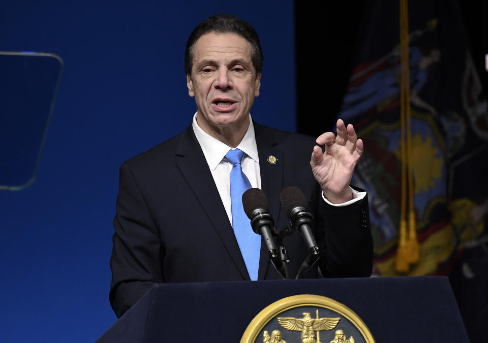 FILE - In this Jan. 15, 2019 file photo, New York Gov. Andrew Cuomo delivers his State of the State address in Albany, N.Y. The governors of Michigan, New York and Washington are asking the Trump administration to let states offer unemployment benefits to federal employees who are working without pay during the government shutdown that began nearly a month ago. (AP Photo/Hans Pennink File)