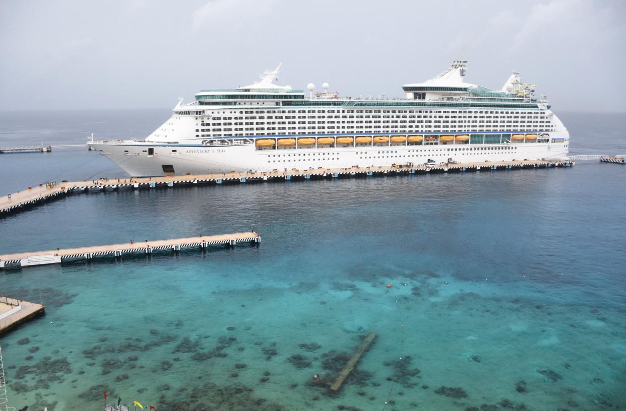 The Royal Caribbean cruise ship ‘Adventure of the Seas,’ the first cruise to arrive in Mexico since the beginning of Covid-19 pandemic, remains docked in the island of Cozumel, off the coast of Mexico’s Quintana Roo State, on 16, June, 2021.  (AFP via Getty Images)