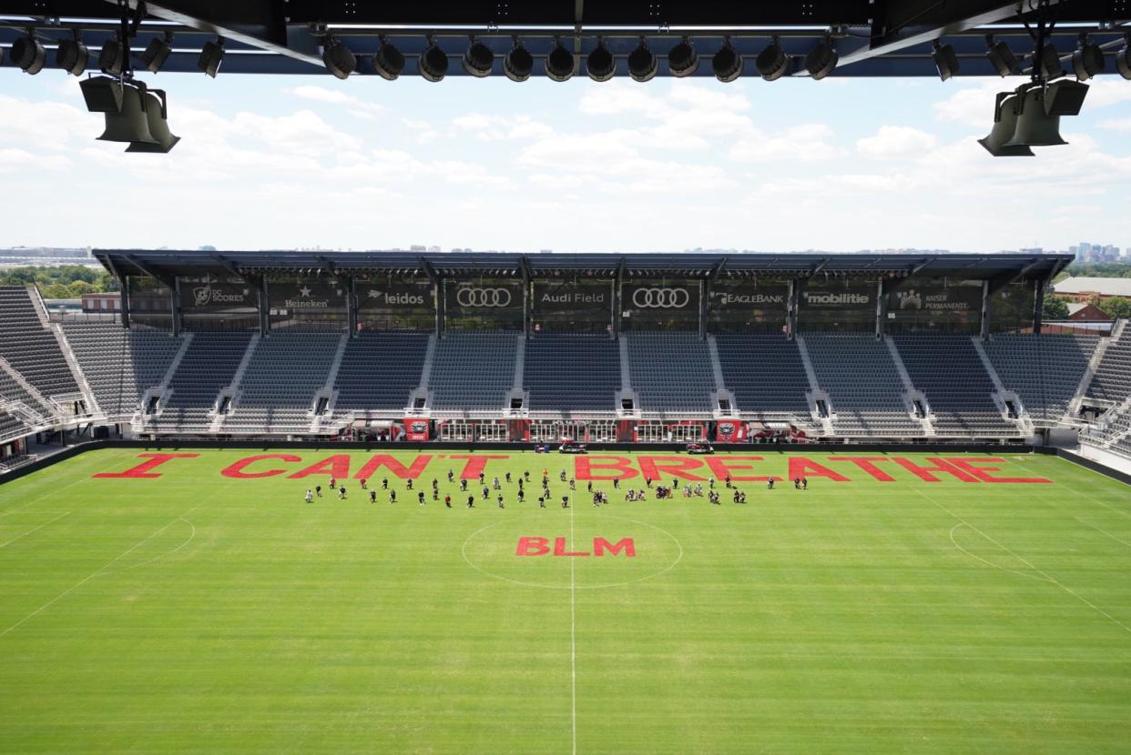 D.C. United showed its support for global protests against police brutally and systemic racism by painting "I Can't Breathe" and "BLM" on the grass at Audi Field. (Via Twitter/@dcunited)