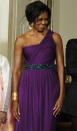 <b>South Korea State Dinner, Oct 2011</b><br><br>This asymetric purple gown shows a favourite style of Michelle's. She paired the Doo.Ri gown with a beaded belt and gold accessories.