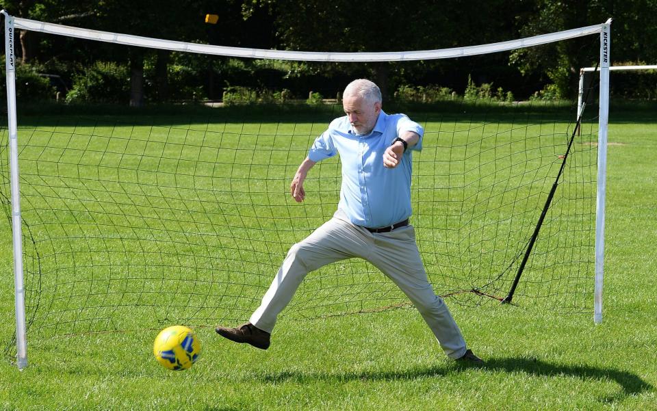 Jeremy Corbyn fails to stop a penalty kick by a child during a visit to Hackney Marshes Football Pitches. The visit was intended to highlight Labour's manifesto commitment to ensure 5% of the Premier League's television rights income is diverted to the grassroots game. - Credit: Getty