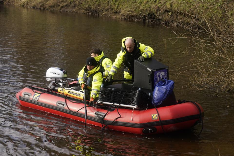 Peter Faulding and his team search the river (PA Wire)