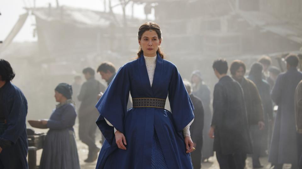 Moiraine Damodred (Rosamund Pike) in a blue robe in  The Wheel of Time season 2.