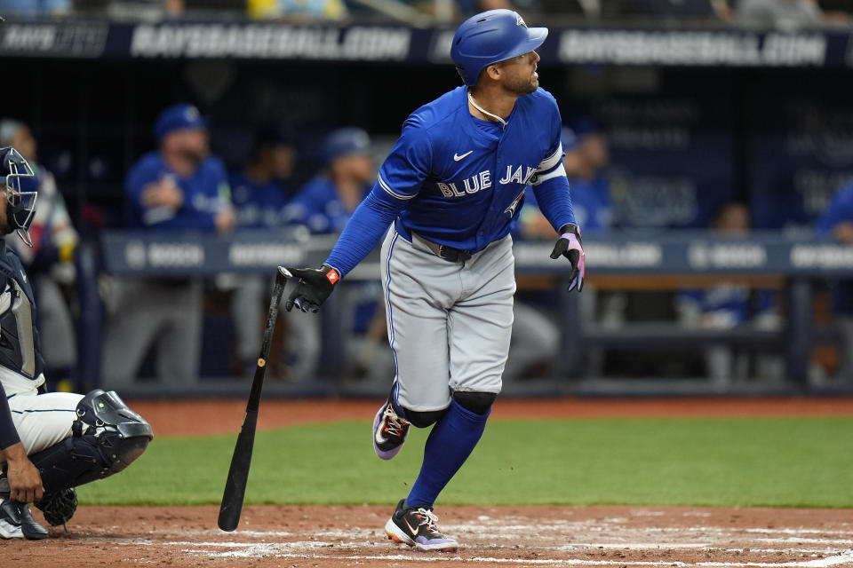 Toronto Blue Jays' George Springer (4) drops his bat as he watches his solo home run off Tampa Bay Rays starting pitcher Zach Eflin during the fourth inning of a baseball game Thursday, March 28, 2024, in St. Petersburg, Fla. (AP Photo/Chris O'Meara)