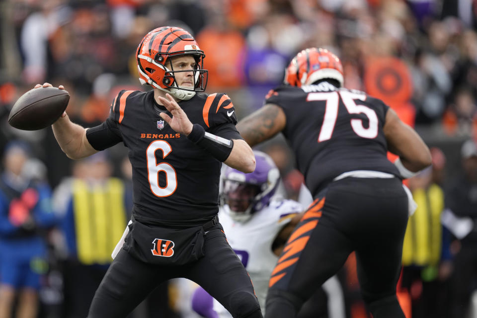 Cincinnati Bengals quarterback Jake Browning (6) throws a pass during the first half of an NFL football game against the Minnesota Vikings, Saturday, Dec. 16, 2023, in Cincinnati. (AP Photo/Carolyn Kaster)