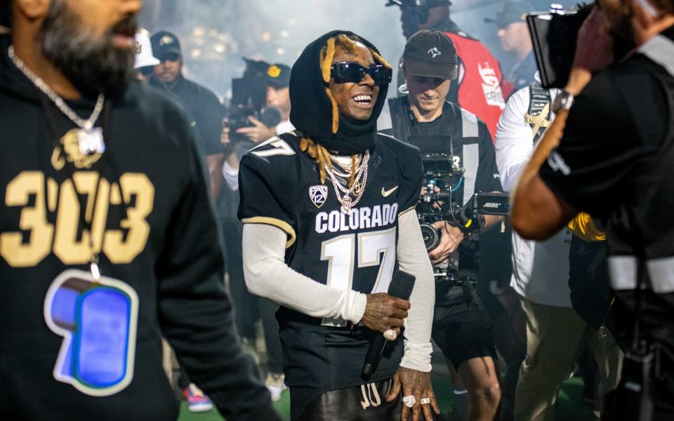 Lil Wayne comes out of the CU football locker room to give a live pregame performace before the Rocky Mountain Showdown on Sept. 16, 2023 at Folsom Field in Boulder, Colo.
