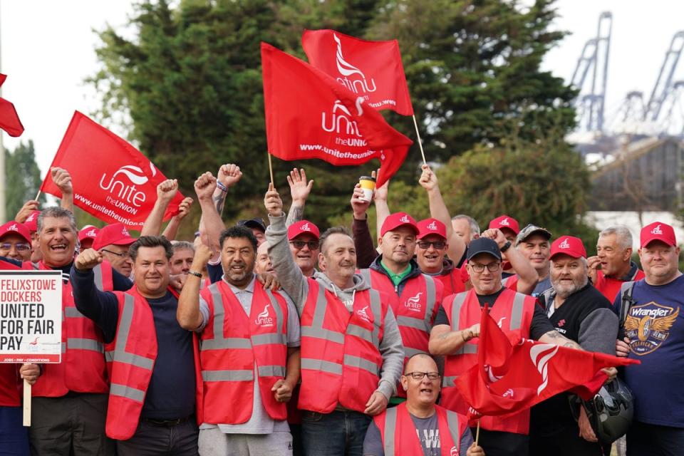 21 August 2022: Members of the Unite union man a picket line at one of the entrances to the Port of Felixstowe in Suffolk, Britain's biggest and busiest container port, after backing industrial action by 9-1 in a dispute over pay (PA)