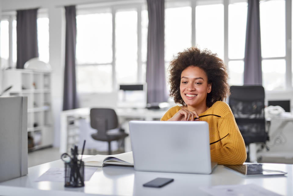 Businesswoman using laptop in office. (Getty Images/iStockphoto)