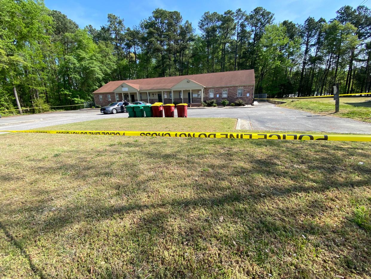 Police tape ropes off the office building on Fort Mahone Street in Petersburg, Virginia, Saturday, April 23, 2022. The night before, a man was shot in the parking lot and later died. He was one of six people shot in three separate incidents across Petersburg Friday night.