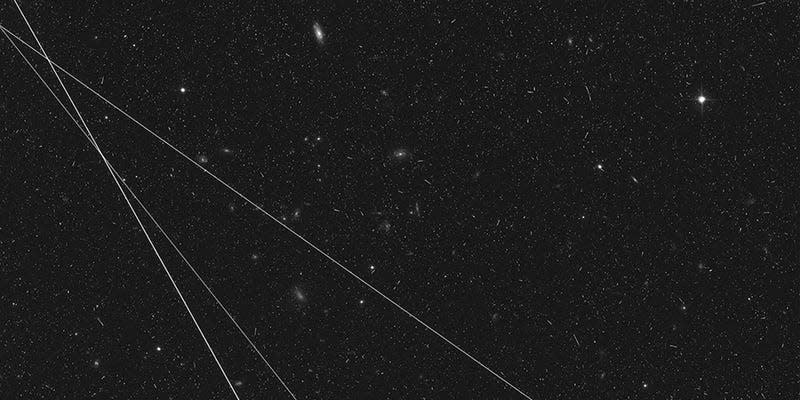 Three distinct streaks appear in this Hubble image.