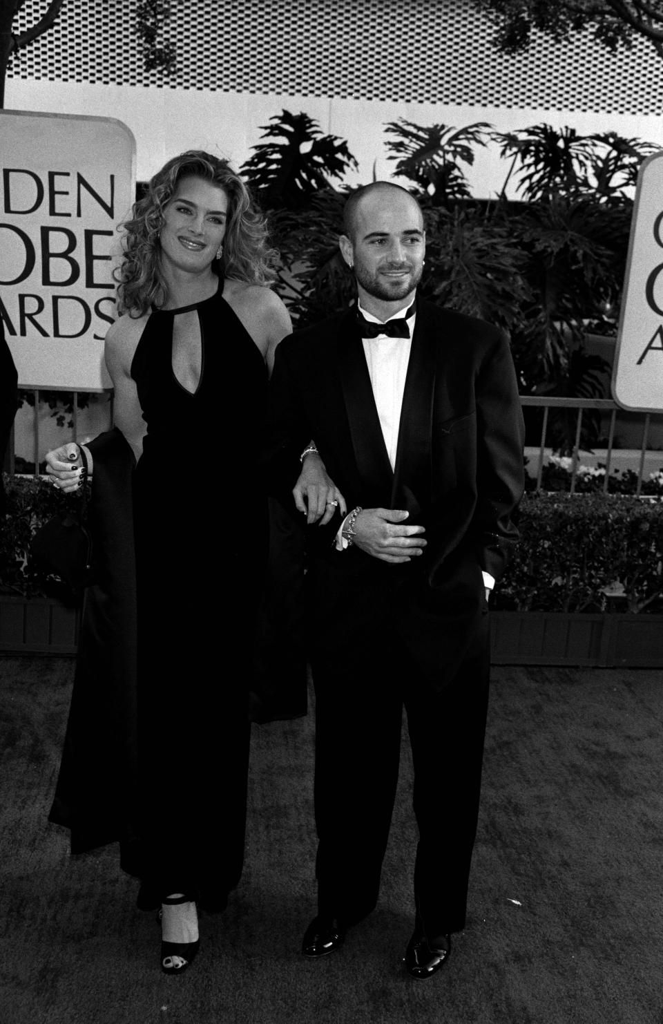 Brooke Shields and Andre Agassi attend the 54th Golden Globe Awards at the Beverly Hilton Hotel in Beverly Hills, California, on January 19, 1997. (Photo by Donato Sardella/Penske Media via Getty Images)