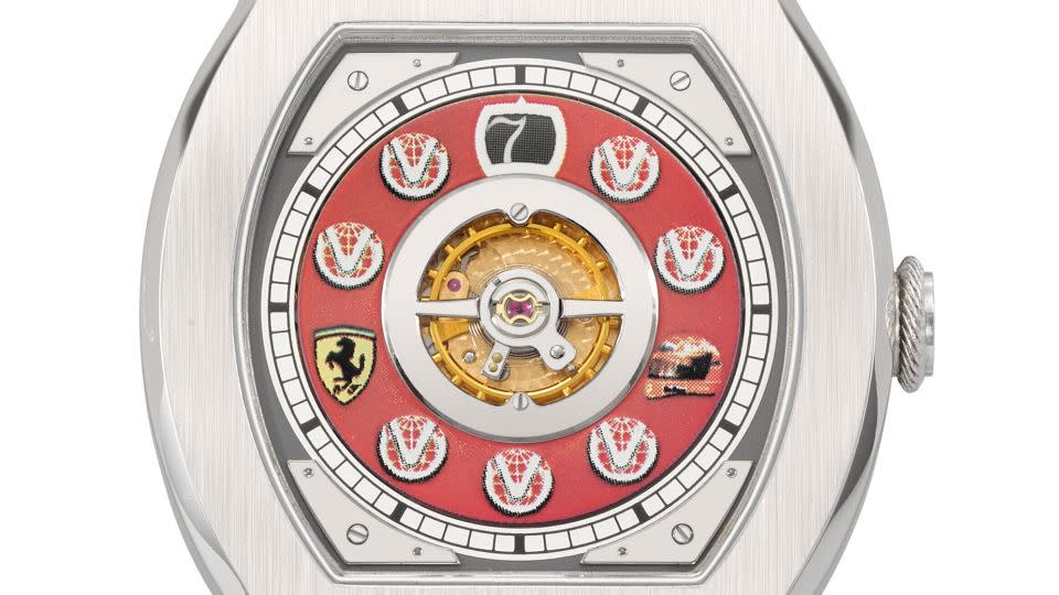 Schumacher's platinum F.P. Journe Vagabondage 1 features a striking red dial and features that celebrate his seven F1 Driver's World Championships. - Christie's Images LTD. 2024