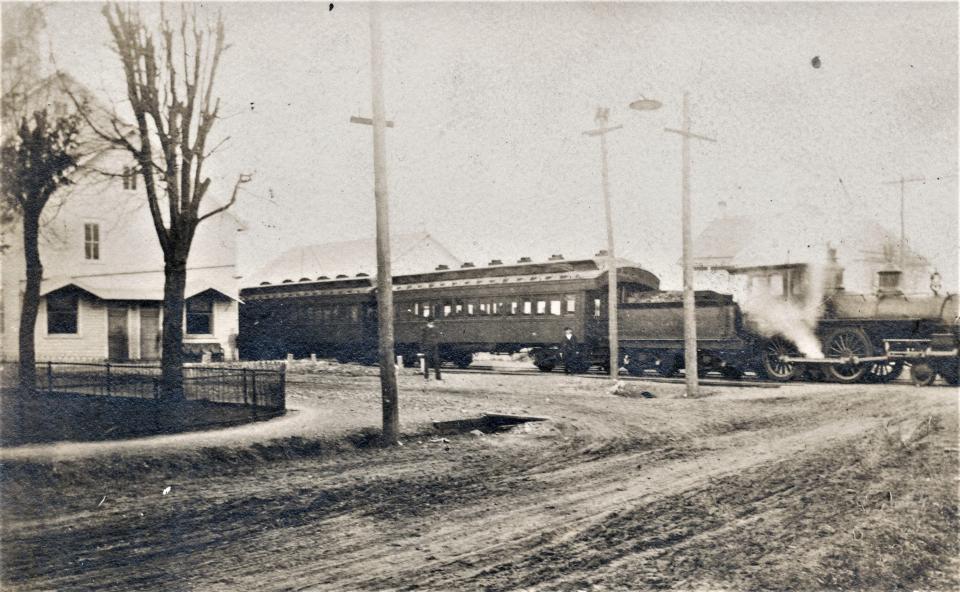 A view of the Cumberland Valley Railroad passenger train leaving the Lemasters Station and Elevator in the early 1900s.