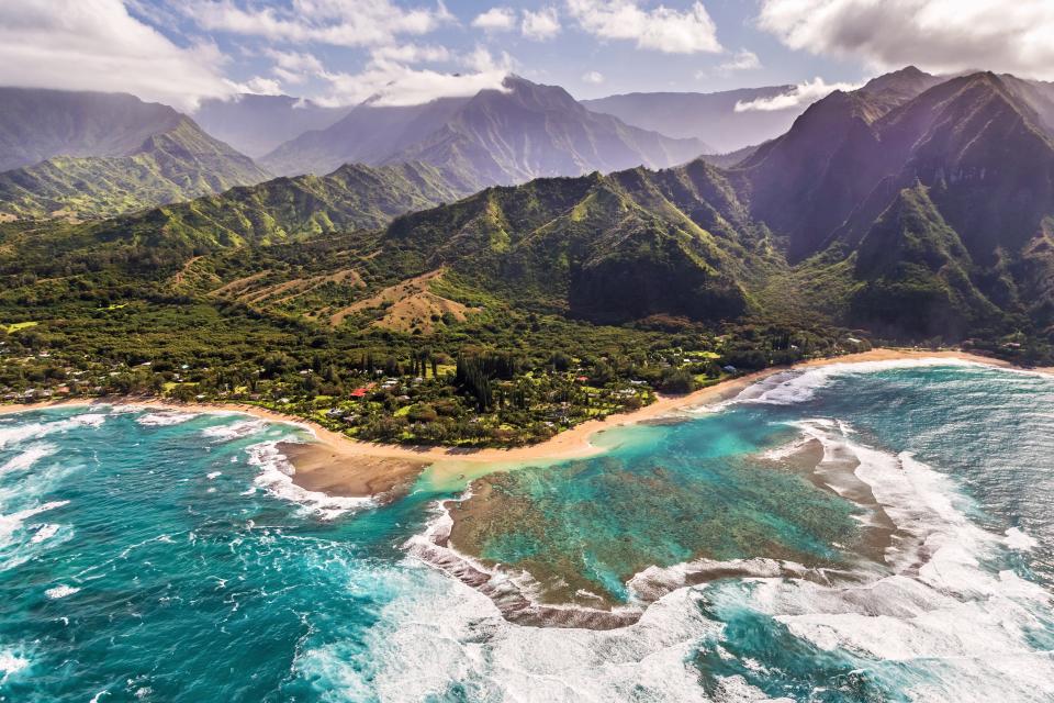 <p>Hawaii is known for being a romantic destination, and the remote feel of <a href="http://www.thedailymeal.com/eat/kauai-hawaii-best-garden-island" rel="nofollow noopener" target="_blank" data-ylk="slk:Kauai;elm:context_link;itc:0;sec:content-canvas" class="link "><strong>Kauai</strong></a> makes it the best island for romance and stunning scenery. Rent a car on the island and explore. Go to the Waimea Canyon State Park lookouts for breathtaking views of the canyon and drive to the white sand <a href="http://www.thedailymeal.com/hanalei-beach?venue_update=1" rel="nofollow noopener" target="_blank" data-ylk="slk:beaches of Hanalei;elm:context_link;itc:0;sec:content-canvas" class="link "><strong>beaches of Hanalei</strong></a> for amazing snorkeling opportunities. For a hotel that matches the serenity of the island, stay at the <a href="http://www.thedailymeal.com/grand-hyatt-kauai-resort-and-spa?venue_update=1" rel="nofollow noopener" target="_blank" data-ylk="slk:Grand Hyatt Resort and Spa;elm:context_link;itc:0;sec:content-canvas" class="link "><strong>Grand Hyatt Resort and Spa</strong></a>.</p><p><a href="http://www.thedailymeal.com/travel/kauai-restaurants-3-dont-miss-spots" rel="nofollow noopener" target="_blank" data-ylk="slk:Don’t miss these three restaurants when you visit Kauai;elm:context_link;itc:0;sec:content-canvas" class="link "><strong>Don’t miss these three restaurants when you visit Kauai</strong></a><strong>.</strong></p>