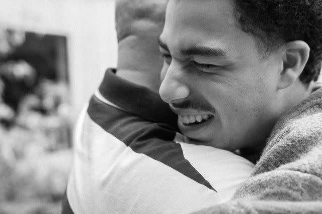 <p>Tommy Oliver</p> Marcus Scribner and his father Tony.