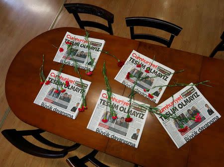 Carnations and today's copies are seen in the newsroom of Cumhuriyet newspaper, an opposition secularist daily, in Istanbul, Turkey, November 1, 2016. REUTERS/Murad Sezer