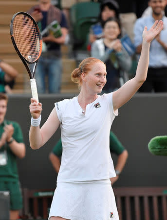 Tennis - Wimbledon - All England Lawn Tennis and Croquet Club, London, Britain - July 5, 2018. Belgium's Alison Van Uytvanck celebrates winning her second round match against Spain's Garbine Muguruza . REUTERS/Toby Melville