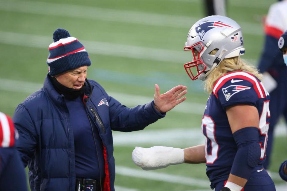 New England Patriots head coach Bill Belichick congratulates defensive lineman Chase Winovich (50) on a good play during an NFL football game against the New York Jets, Sunday, Jan. 3, 2021, in Foxborough, Mass. (AP Photo/Stew Milne) ORG XMIT: NYOTK