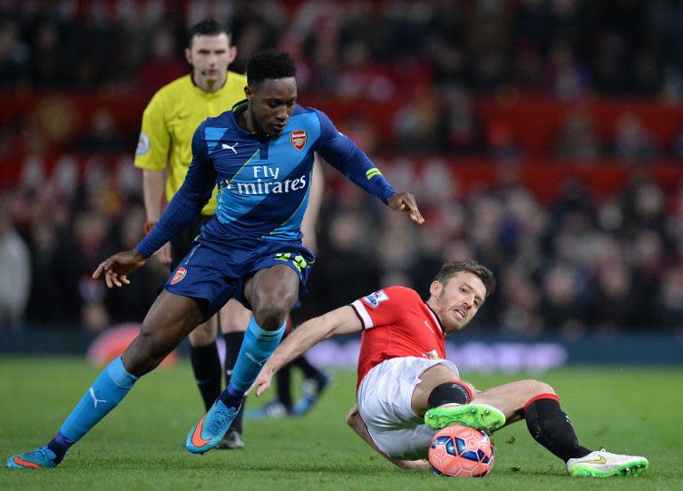 Louis van Gaal gave an unconvincing explanation why he sold Danny Welbeck (centre) to make way for Radamel Falcao