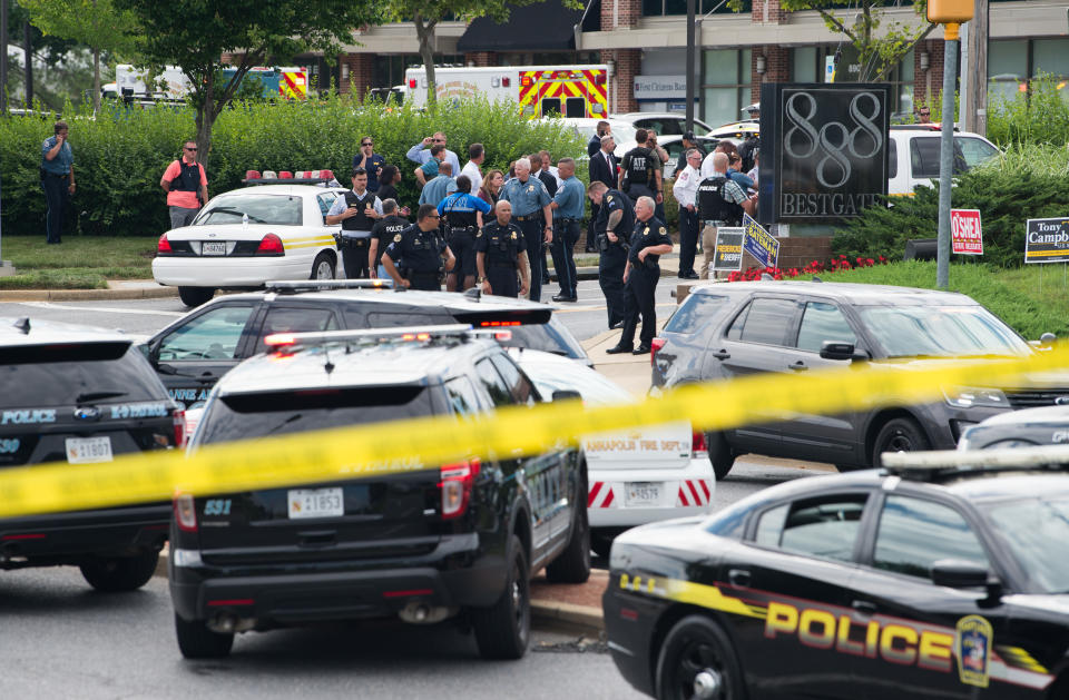 Police respond to a shooting at the office building that houses the Capital Gazette newsroom in Annapolis, Maryland, on Thursday. (Photo: SAUL LOEB via Getty Images)