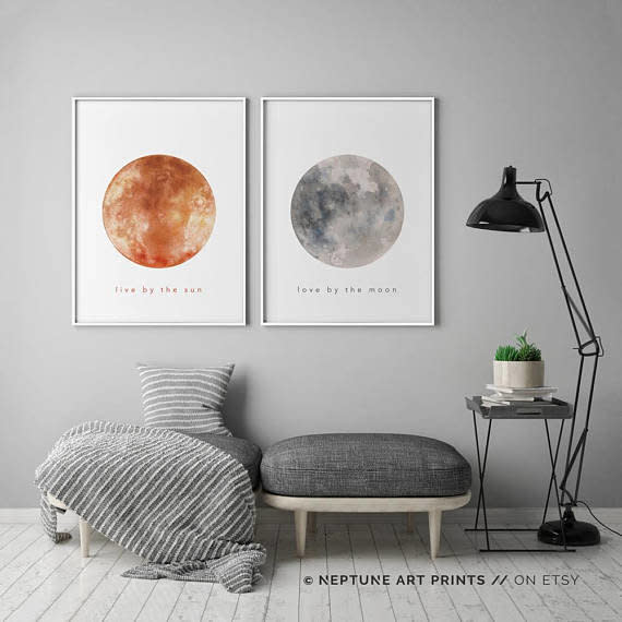 How adorable would these "Live by the sun, love by the moon" pictures look over a bed? You can order the <a href="https://www.etsy.com/listing/532259928/live-by-the-sun-love-by-the-moon-set-of" target="_blank">digital download here</a>, and snag <a href="https://www.etsy.com/listing/505592956/poster-hanger-poster-frame-poster" target="_blank">unique poster hangings for them here</a>.&nbsp;&nbsp;