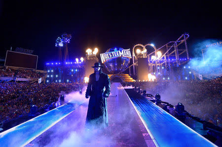 WWE Superstar the Undertaker walks toward the ring at WrestleMania 33 in Orlando, Florida, United States in this April 2, 2017 handout photo. WWE/Handout via REUTERS