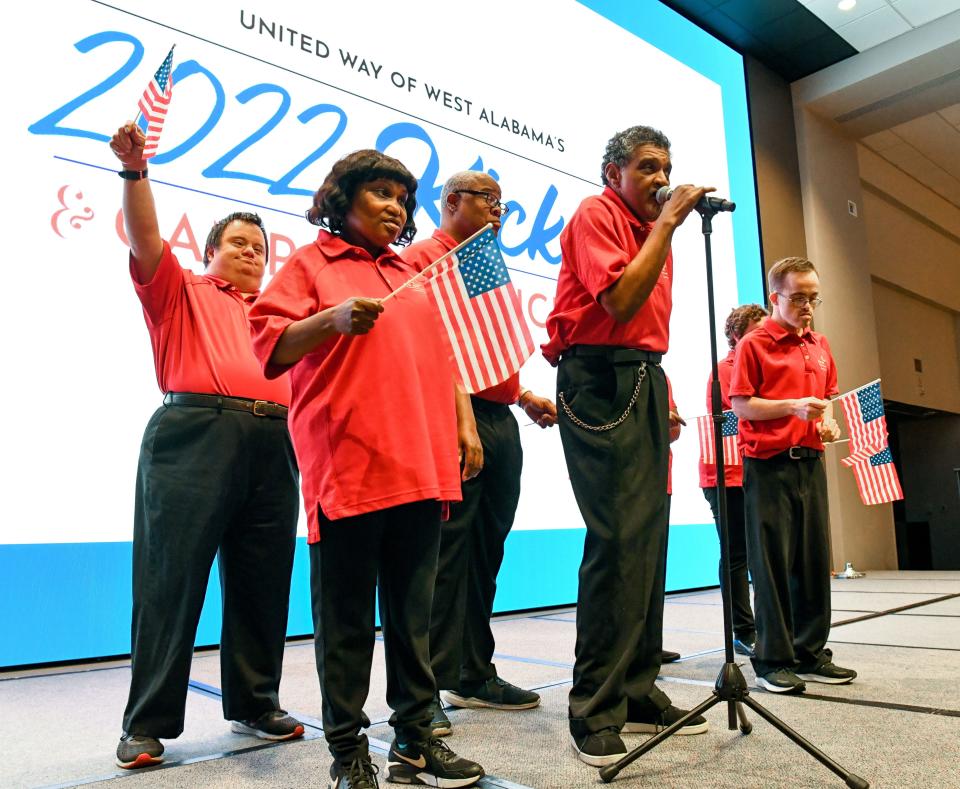 Aug 9, 2022; Tuscaloosa, AL, USA; The United Way of West Alabama kicked off the the 2022-23 campaign drive with the first in-person event in three years Tuesday, Aug. 9, 2022 at the Bryant Conference Center in Tuscaloosa. The Sounds of Joy from the Arc of Tuscaloosa County perform the Lee Greenwood classic, Gold Bless the USA. Gary Cosby Jr.-Tuscaloosa News