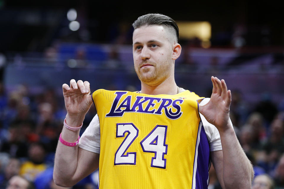 A fan shows off a Kobe Bryant jersey during the first half between the Orlando Magic and the LA Clippers at Amway Center on January 26, 2020 in Orlando, Florida. (Photo by Michael Reaves/Getty Images)