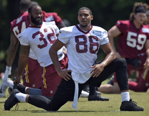 Washington Redskins tight end Jordan Reed (86) stretches during NFL football practice, Tuesday, June 13, 2017, in Ashburn, Va. (AP Photo/Nick Wass)