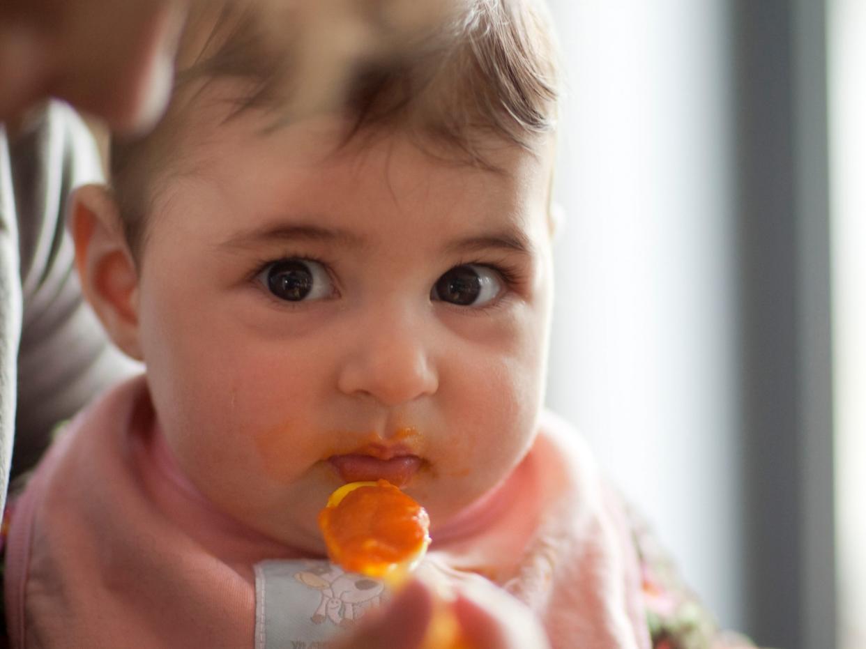 baby eating baby food