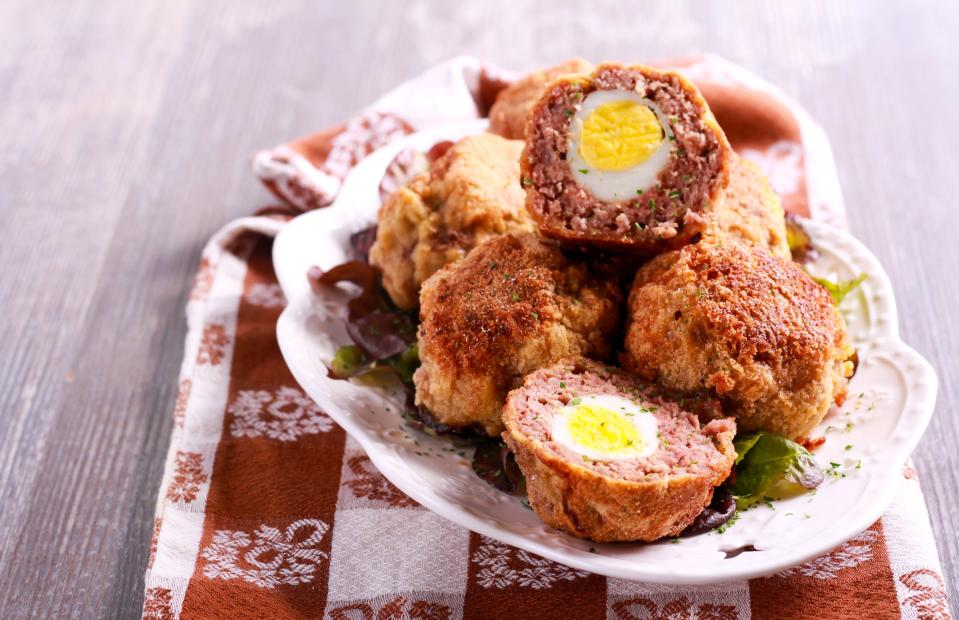 Twitter is furious after a new poll finds Scotch eggs, haggis, and steak and kidney pie are among the least popular British foods.The research, conducted by YouGov, found that classic British delicacies including Beef Wellington and Lancashire hotpot were ranked in the lowest tier on a scale of popularity among Britons.The poll, which analysed the responses of 6,367 British adults, found that just 50-59 per cent of the country ranked the aforementioned dishes as their most favoured foods.Among the lowest rated savoury options were jellied eels (6 per cent), Wales’ laverbread (20 per cent), and Scotland’s faggots (32 per cent) and haggis (37 per cent).However, the findings have angered several social media users, with some championing scotch eggs and haggis as some of the best British delicacies.> What are the very best classic British foods? (savoury edition) > We can now crown Yorkshire Pudding as Britain's finest home-grown food, with 85% of Brits who have tried them saying they like them. Sunday roasts and fish & chips come joint second on 84%https://t.co/2mF0n4khqf pic.twitter.com/pW3xmqQOYu> > — YouGov (@YouGov) > > June 12, 2019One user tweeted: “Surprised scotch eggs did so badly @mattsmithetc? Nonsense!”“Haggis is one of the greatest foods ever given to this country. Absolute heathens,” commented another.“Steak and kidney pudding, black pudding, liver and onions and haggis are not crap!” another stated.“Scotch eggs are 'low tier'? What is wrong with people [sic].”> Surprised scotch eggs did so badly @mattsmithetc? Nonsense!> > — Guy Miscampbell (@guymiscampbell) > > June 12, 2019> Haggis is one of the greatest foods ever given to this country. Absolute heathens> > — Josh 🏴󠁧󠁢󠁳󠁣󠁴󠁿🇪🇺 (@Josh_More) > > June 12, 2019> Steak and kidney pudding, black pudding, liver and onions and haggis are not crap!> > — Stuart J Clarkson (@stuclarkson23) > > June 12, 2019> Scotch eggs are 'low tier'? What is wrong with people> > — andy bullock (@ColdharbourAndy) > > June 12, 2019Meanwhile, others have taken umbrage with the overall colour of the foods rated in the poll.“Why is everything beige?” asked one user.Another described the image as: “Beigefest”“Quite a lot of yellow food!” exclaimed another.> Why is everything beige?> > — This Guy..... (@HamzaH2Hussain) > > June 12, 2019> Beigefest> > — Charlie Woodall (@woodallc87) > > June 12, 2019> Quite a lot of yellow food!> > — Bid Webb (@Bid_Webb) > > June 12, 2019Unsurprisingly, the findings also showed that Britons' most beloved savoury dishes include Yorkshire puddings (85 per cent), fish and chips (84 per cent each), and bacon sandwiches (81 per cent).As for the most popular sweet dish, 80 per cent of participants ranked scones and Victoria sponge cake as their favourite. Other top desserts include hot cross buns (75 per cent), sticky toffee pudding (73 per cent), Bakewell tart (72 per cent) and Eton mess (70 per cent).However, it’s a sorry day for fans of Battenberg cake, Spotted dick and Eccles cakes, with less than 60 per cent of Britons voting them as their favourite sweet concoctions.The survey comes weeks after a Channel 5 documentary found that Britain’s favourite crisps included Doritos, Pringles and Walkers at the top of the list.Channel 5 shared these findings in a pyramid format on Twitter, sparking a subsequent outbreak of fury.
