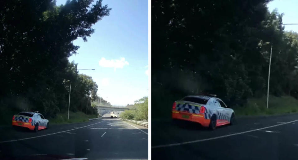 The police car on the side of the on ramp to the M4 in Sydney, NSW.