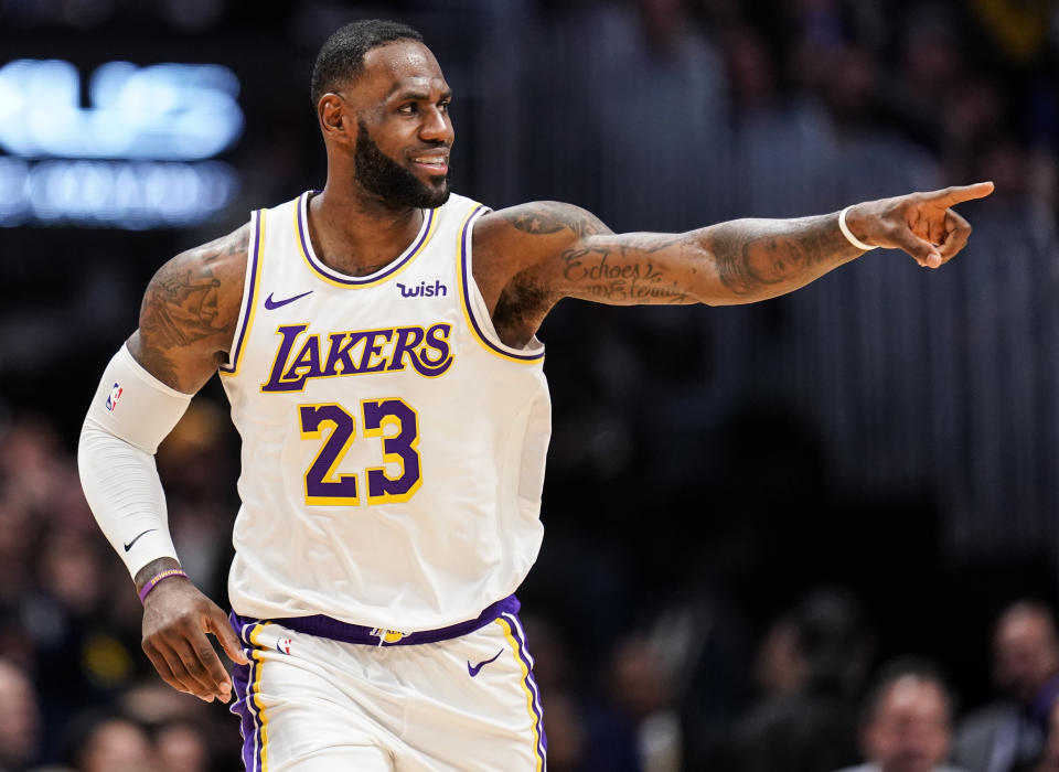 Los Angeles Lakers forward LeBron James celebrates a basket during the second half of the team's NBA basketball game against the Denver Nuggets on Tuesday, Dec. 3, 2019, in Denver. The Lakers won 105-96. (AP Photo/Jack Dempsey)